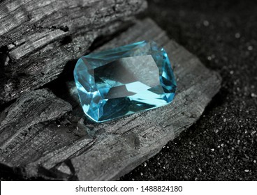 Faceted Blue Jewelry Gemstone Aquamarine On Black Background