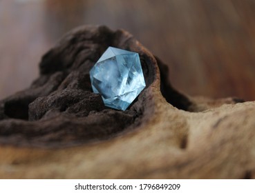 Faceted Blue Topaz On A Gnarled Wood Background