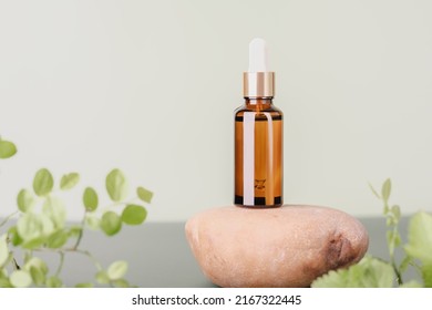 Facial Collagen Peptide Serum In Brown Glass Dropper Bottle On Stone Podium. Vitamin Summer Face Care, Hyaluronic Acid For Anti Age Beauty