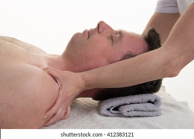 Facial And Cranial Osteopathy Therapy In A Medical Room