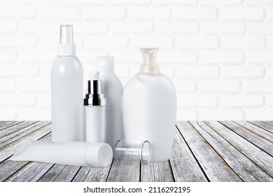 Facial cream and another cosmetic on the table. Mockup for design - Shutterstock ID 2116292195
