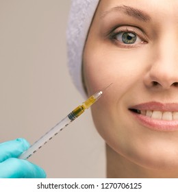 Facial injecting treatment. Skin platelet. Prp rich plasma injection. Beauty woman. Doctor gloves.