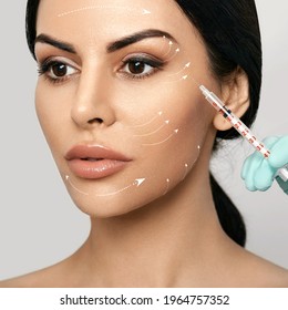 Facial mesotherapy. Face with lift arrows. Beautician doing anti-aging injection for tightening skin and remove wrinkles - Shutterstock ID 1964757352