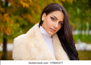 Facial Portrait Of A Beautiful Arab Woman Warmly Clothed Autumn Outdoor