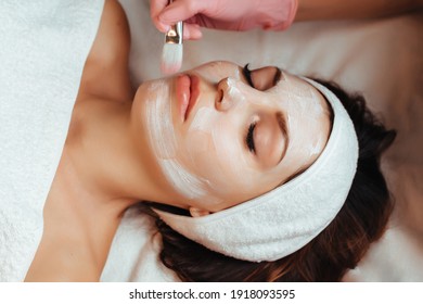 facial rejuvenation treatment with cream at the spa
