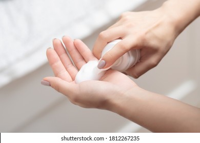 Facial skin care, women's hands with face wash foam - Shutterstock ID 1812267235