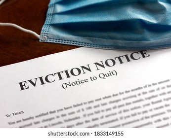 facial or surgical mask on top of the eviction note  - Shutterstock ID 1833149155