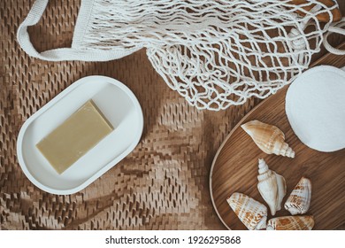 Facial wipes and wicker basket with seashells in a boho interior - Powered by Shutterstock