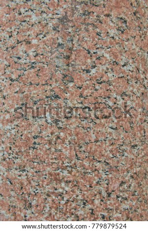 Facing material red granite texture. Natural stone granite background texture. Bright hard red granitic rock texture. Red granite granitic stone background texture. Red granite untreated surface.