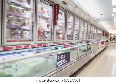 Facing View Of Frozen Aisle In Grocery Store