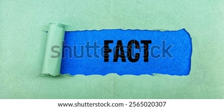 Fact Concept - Text Displayed on blue Torn Background. 