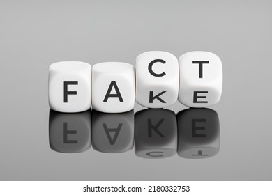 Fact or Fake concept. Flip blocks change the word fake to fact. April fools day - Shutterstock ID 2180332753