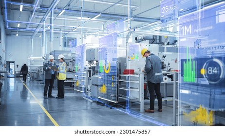 Factory Digitalization: Two Industrial Engineers Use Laptop Computer, Big Data Statistics Visualization, Optimization of High-Tech Electronics Facility. Industry 4.0 Machinery Manufacturing Products