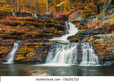 Factory Falls surrounded by vivid fall foliage at  Delaware Water Gap in Pocono Mountains, PA