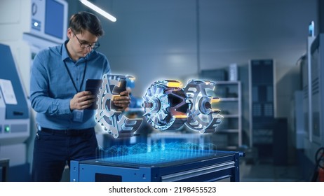 Factory Office Facility: Chief Engineer Developer Holds Tablet Computer, Examins Augmented Reality Model of an Electric Generator. Modern Industry 4.0 Research and Development Center Concept. - Powered by Shutterstock