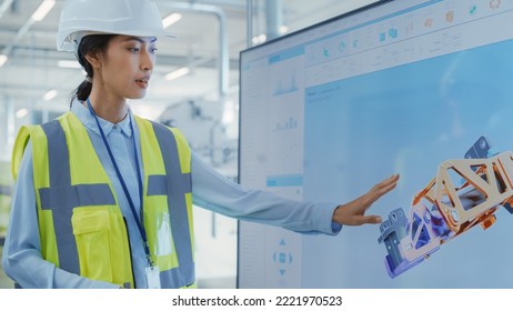 Factory Office Meeting: Female Chief Engineer Explaining New Workflow for Heavy Industry Hydraulic Parts Production to Company Director in a Conference Room with TV. Showing 3D Layout on Screen. - Powered by Shutterstock