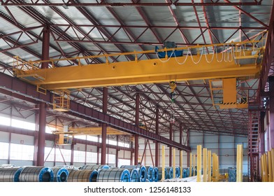 Factory overhead crane hook and chain - Powered by Shutterstock