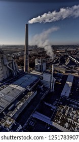 Factory Pollution Over City Scape