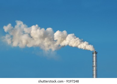 Industrial Smokestack Spewing White Polluting Smoke Stock Photo