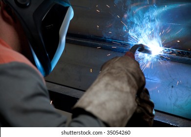 Factory welder doing his job