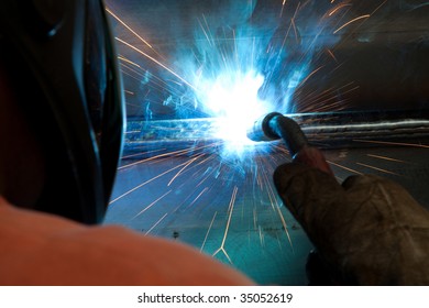 Factory welder during welding - detail
