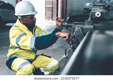 Factory Worker Or Engineer Do Machine Job In Adept Manufacturing Workshop . Industrial People And Manufacturing Labor Concept .