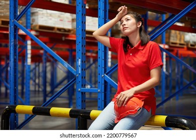 Factory Worker Feeling Tired From Hard Work In The Warehouse Storage