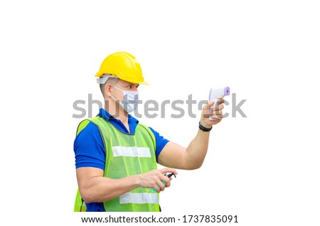 Factory worker man with clipping path checking fever by digital thermometer for scan and protect from Coronavirus (COVID-19) on white background, Healthcare Concept