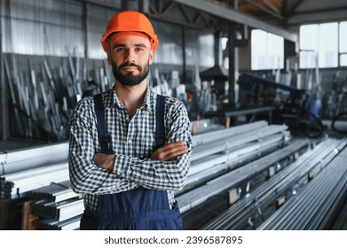 Factory worker measures the metal profile. - Powered by Shutterstock