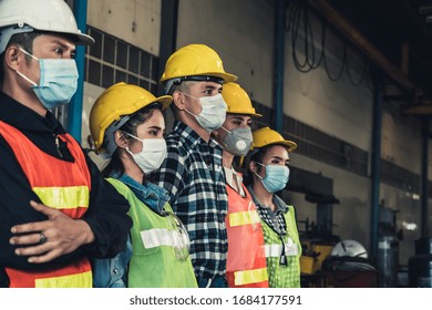 Factory Workers With Face Mask Protect From Outbreak Of Corona Virus Disease 2019 Or COVID-19.