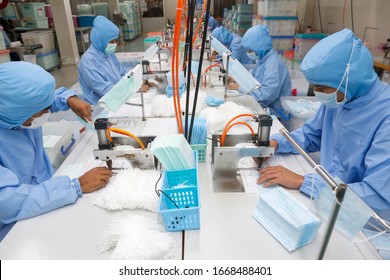 Factory Workers Are Producing Masks For Protection Against Viruses.