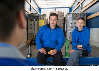 Factory workers taking break