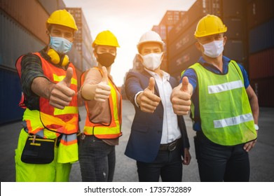 Factory Workers Team With Businessman Engineer And Foreman Wear Medical Face Mask To Protection From Outbreak Of Coronavirus Disease 2019 - COVID-19, Concepts Of Employee Welfare