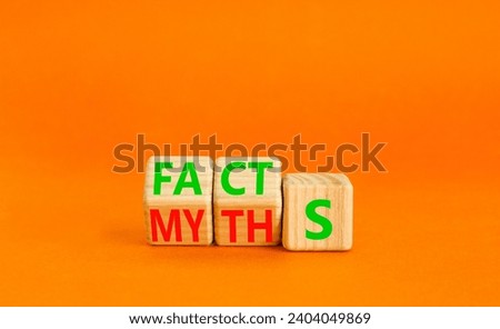 Facts or myths symbol. Concept word Myths and Facts. Beautiful orange table orange background. Business and facts or myths fact myth concept. Copy space.