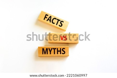 Facts vs myths symbol. Concept words Facts vs myths on wooden blocks on a beautiful white table white background. Business, finacial and facts vs myths concept. Copy space.