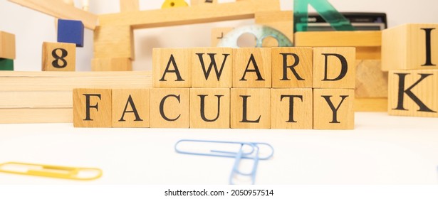 Faculty Award Made From Wooden Cubes. Education Concept. Close-up.