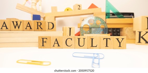 Faculty Award Made From Wooden Cubes. Education Concept. Close-up.