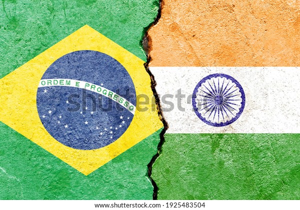 Faded Brazil VS India national flags icon
pattern isolated on broken weathered cracked wall background,
abstract international political relationship friendship conflicts
concept texture wallpaper