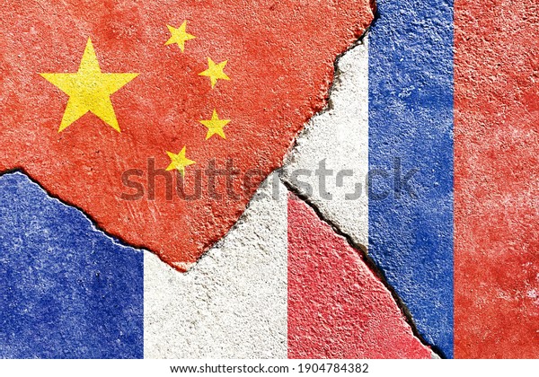 Faded China vs Russia vs France national flags
icon isolated on broken weathered cracked wall background, abstract
international politics relationship friendship conflicts concept
texture wallpaper