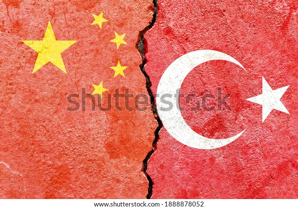 Faded China VS Turkey national flags icon\
isolated on broken weathered cracked concrete wall background,\
abstract international political relationship friendship conflicts\
concept texture wallpaper