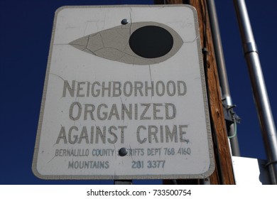 Faded Neighborhood Watch Sign