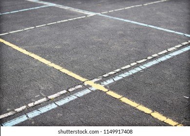 Faded Painted Lines On An Old School Netball Basketball Court