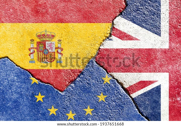 Faded Spain VS UK VS EU national flags icon on\
broken weathered wall with cracks, abstract international country\
political economic relationship conflicts pattern texture\
background wallpaper