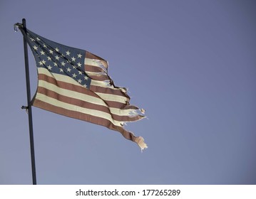 Faded And Tattered American Flag