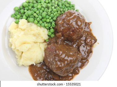 Faggots, peas and mashed potatoes with a rich onion gravy