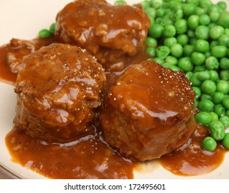 Faggots (traditional meatballs with offal), peas and gravy.