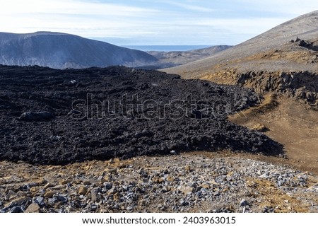Fagradalsfjall volcano lava field with frozen basaltic lava created after eruption and steaming vents, Iceland.