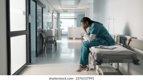 Fail, crying or doctor with stress in hospital unhappy with healthcare results or medical problem. Depression, mistake or sad woman nurse frustrated by grief, death or loss in clinic with headache - Powered by Shutterstock