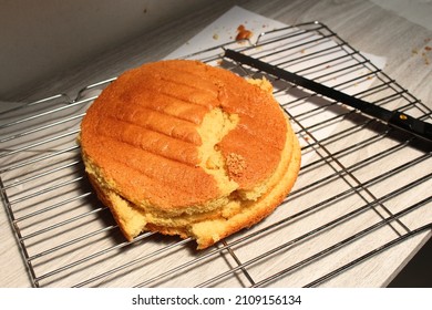 Failed And Broken Cake On A Cooling Rack