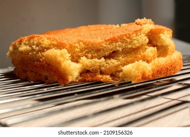 Failed And Broken Cake On A Cooling Rack